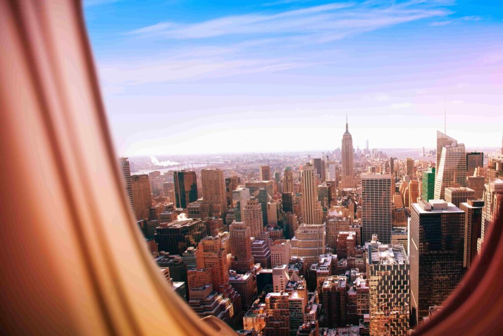 private jet to NYC, New York skyline from jet window