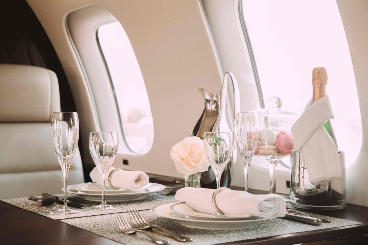 private jet plane amenities: table on jet set beautifully