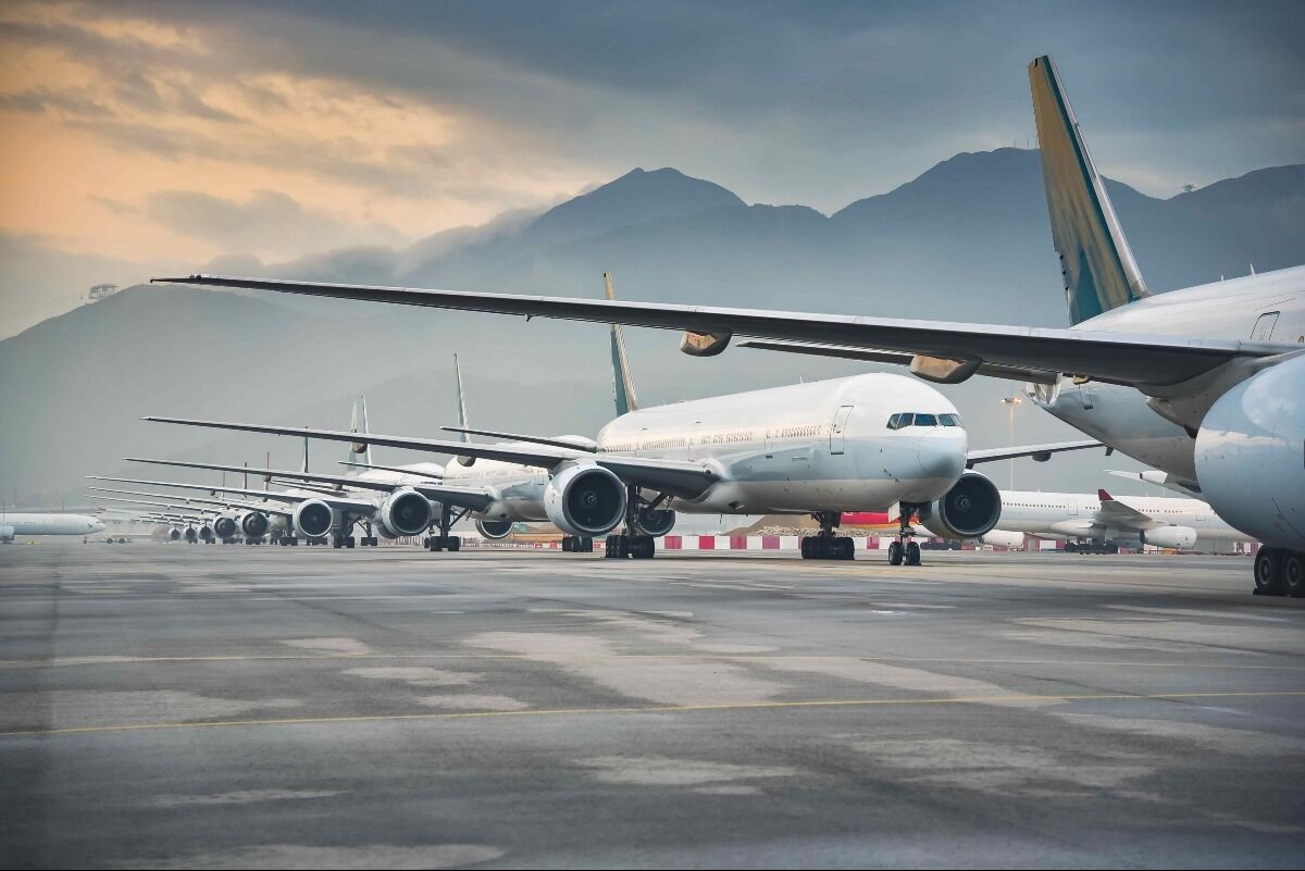 private jet planes parked in a row